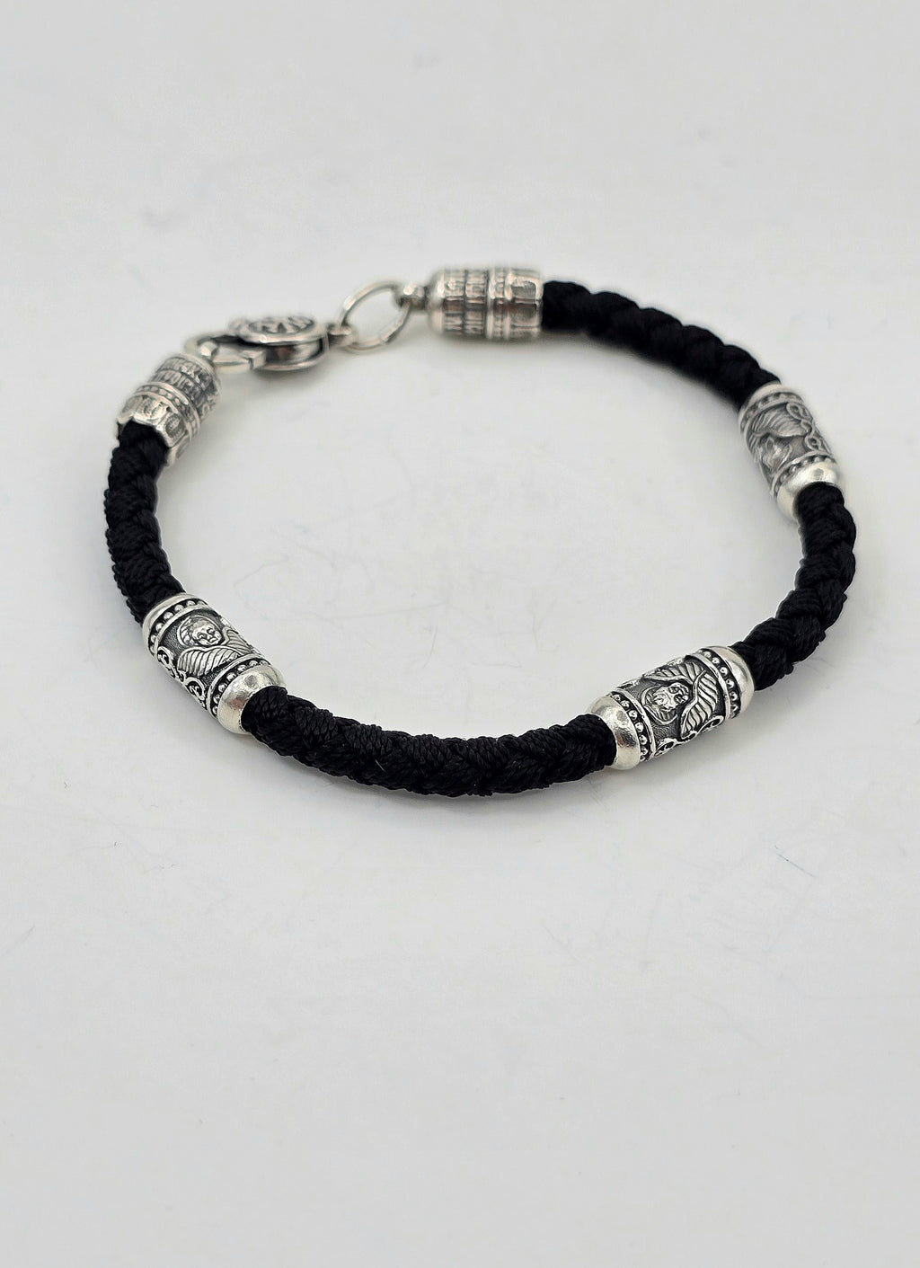 Шовковий браслет з срібними вставками 471.32/22ч " Серафими"